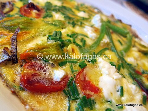 Omelet With Zucchini Blossoms, Crispy Onions, Feta & Tarragon
